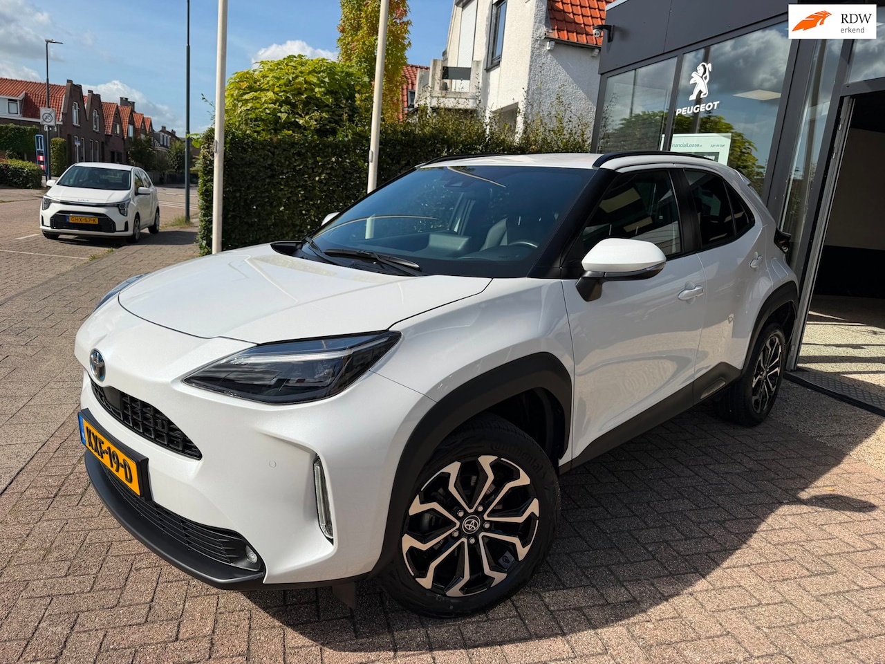 Toyota Yaris Cross - 1.5 Hybrid Dynamic|Half Leder|PDC - AutoWereld.nl
