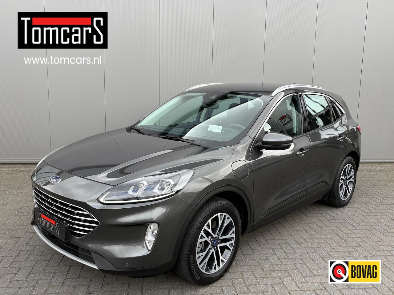 Ford Kuga - 2.5 PHEV Titanium Elektr.-trekhaak/Navigatie/Camera/Carplay-Android-auto - AutoWereld.nl