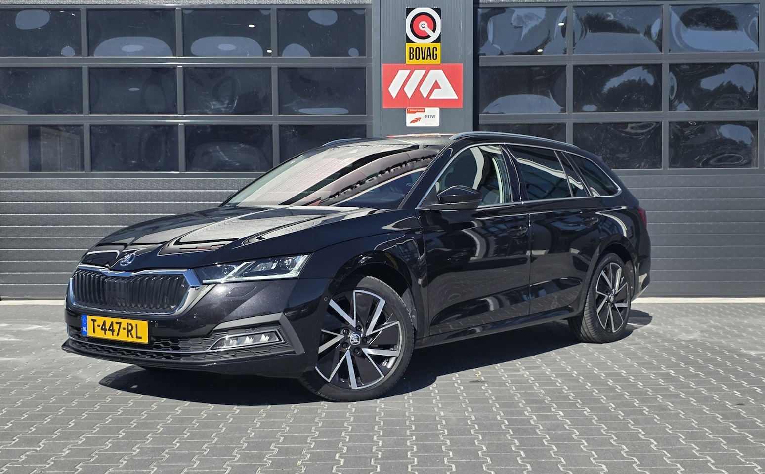Skoda Octavia Combi - 1.4 TSI iV PHEV Business Edition Plus | 2X MEMORY | HUD | CAMERA | ACC | WINTERPAKKET | EL - AutoWereld.nl