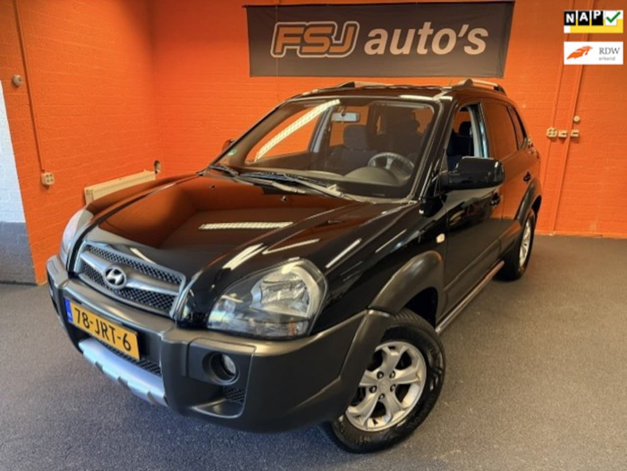 Hyundai Tucson - 2.0i Style Cross / Airco / APK tot 06-08-2027 - AutoWereld.nl