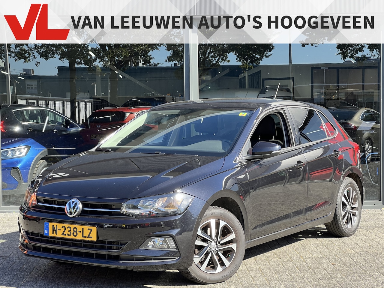 Volkswagen Polo - 1.0 TSI Highline Business R | Navi | Stoelverwarming | Trekhaak | 116 PK - AutoWereld.nl