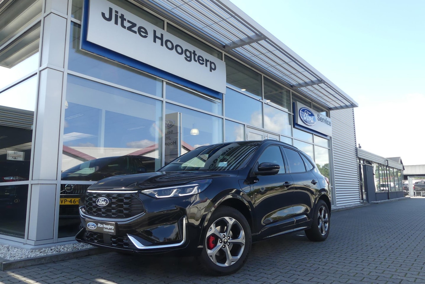 Ford Kuga - 2.5 PHEV ST-Line X ELEKT. TREKHAAK, PANO, AGR, HUD, MEMORY, 360° CAMERA, WINTER PACK, ADAP - AutoWereld.nl