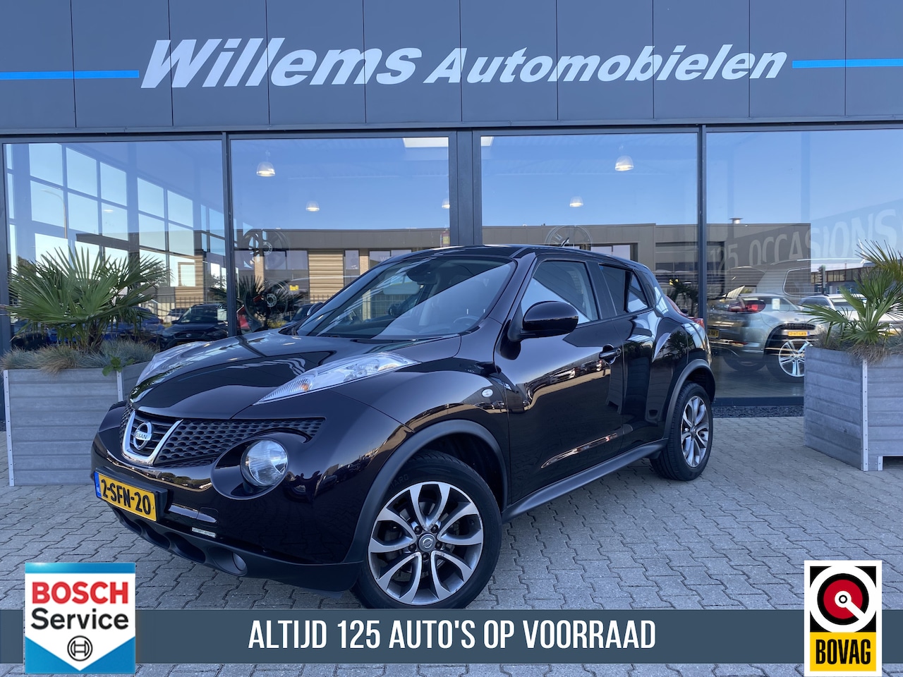 Nissan Juke - 1.6 Tekna Cruise Control, Camera & Stoelverwarming - AutoWereld.nl