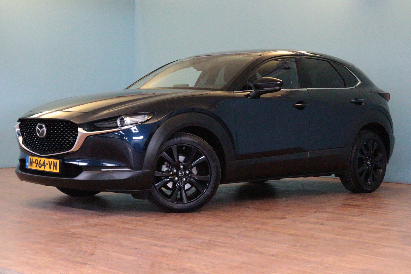 Mazda CX-30 - 2.0 e-SkyActiv-X M Hybrid Sportive Automaat | NAVI | CAMERA + PDC | STOELVERW | ADAP CRUIS - AutoWereld.nl