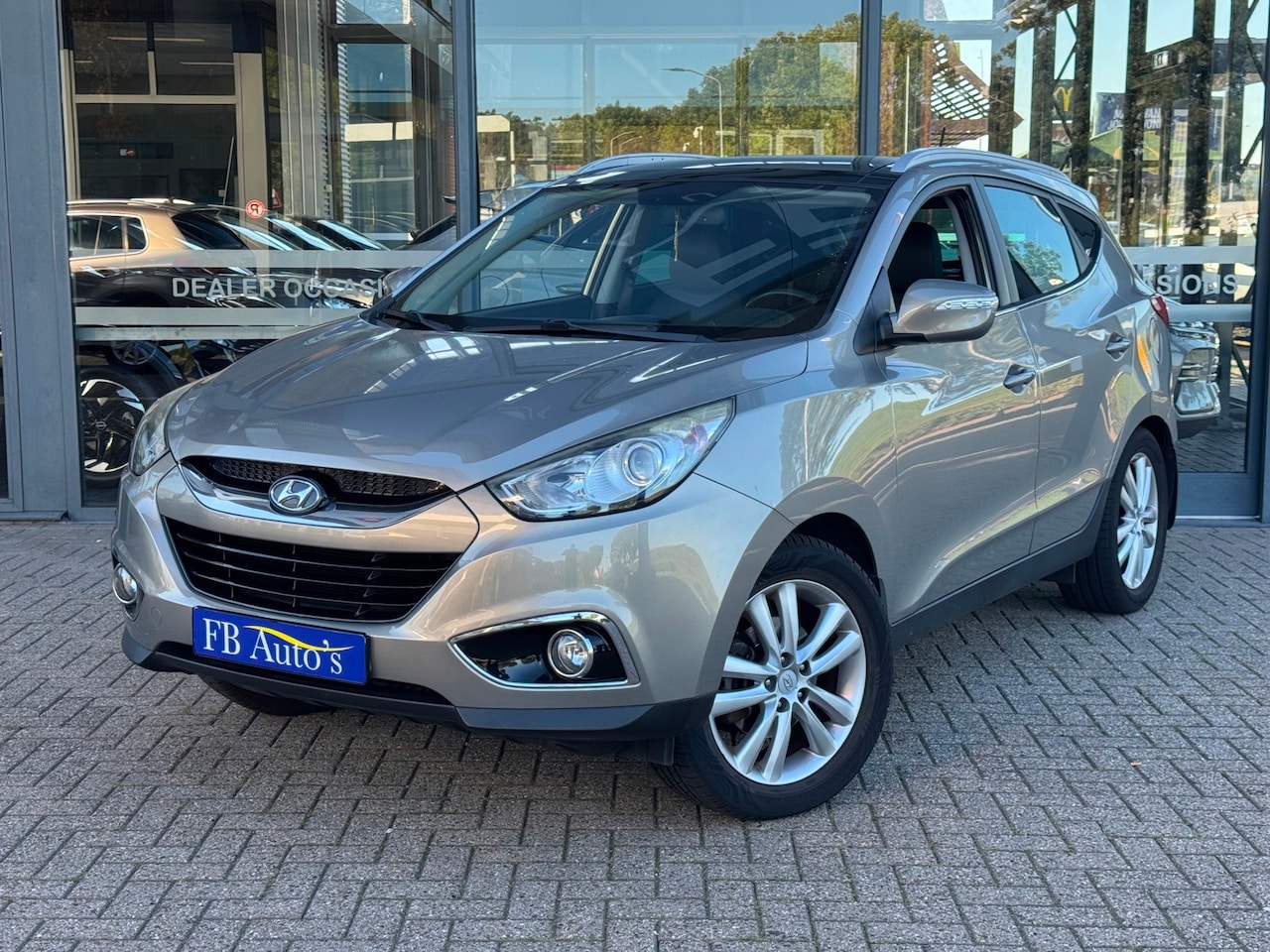 Hyundai ix35 - 2.0i i-Catcher Airco Navi Automaat Cruise - AutoWereld.nl