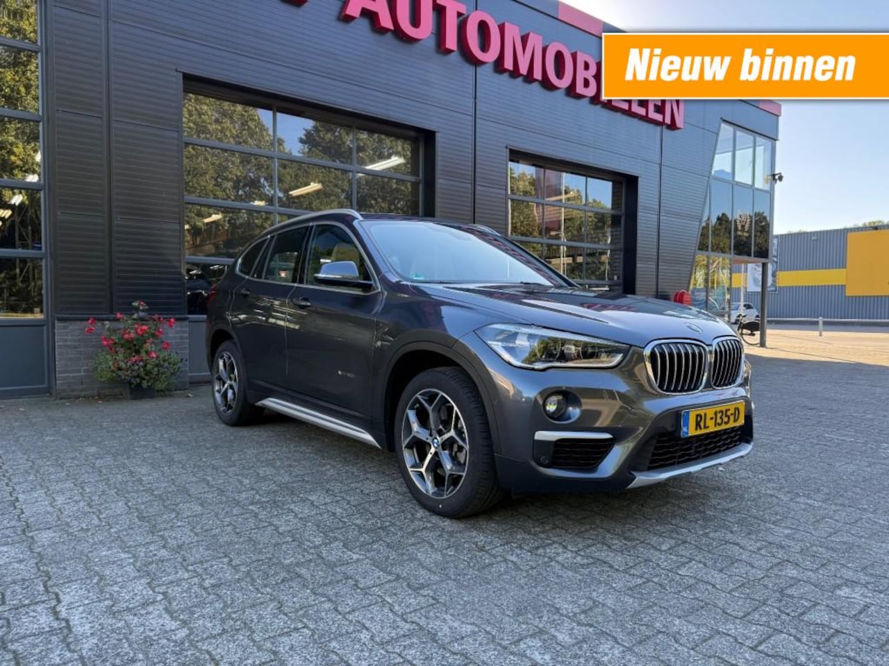 BMW X1 - XDRIVE20I HIGH EXEC. BJ.2018 PANO TREKHAAK HEAD-UP LEDER - AutoWereld.nl