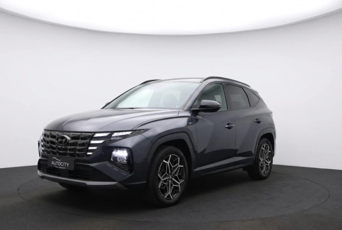 Hyundai Tucson - 1.6 T-GDI PHEV N-Line Sky 4WD 265PK 100% SOH Pano l 360° | Trekhaak - AutoWereld.nl