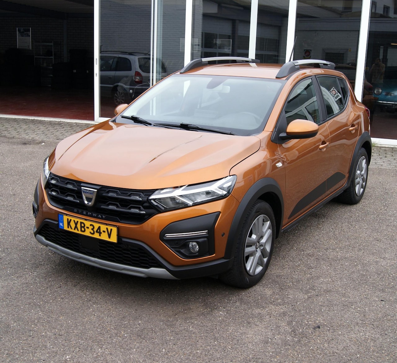 Dacia Sandero Stepway - 1.0 TCe 90 Comfort Navi,Camer,Cruise,Airco,Trekhaak,RIJKLAARPRIJS!! - AutoWereld.nl