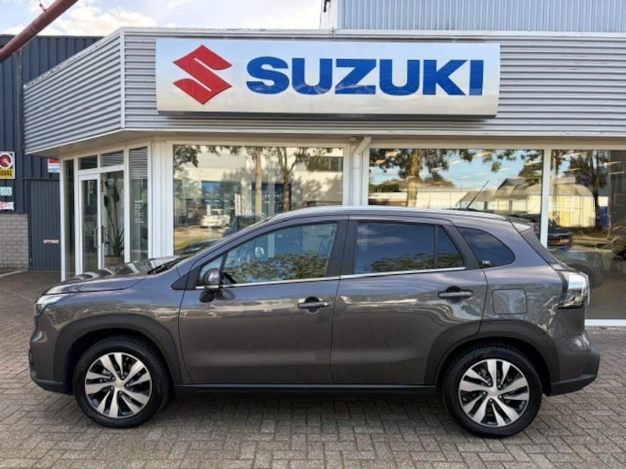 Suzuki S-Cross - 1.4 Smart Hybrid AllGrip Style (rijklaar) 10 jaar garantie. - AutoWereld.nl