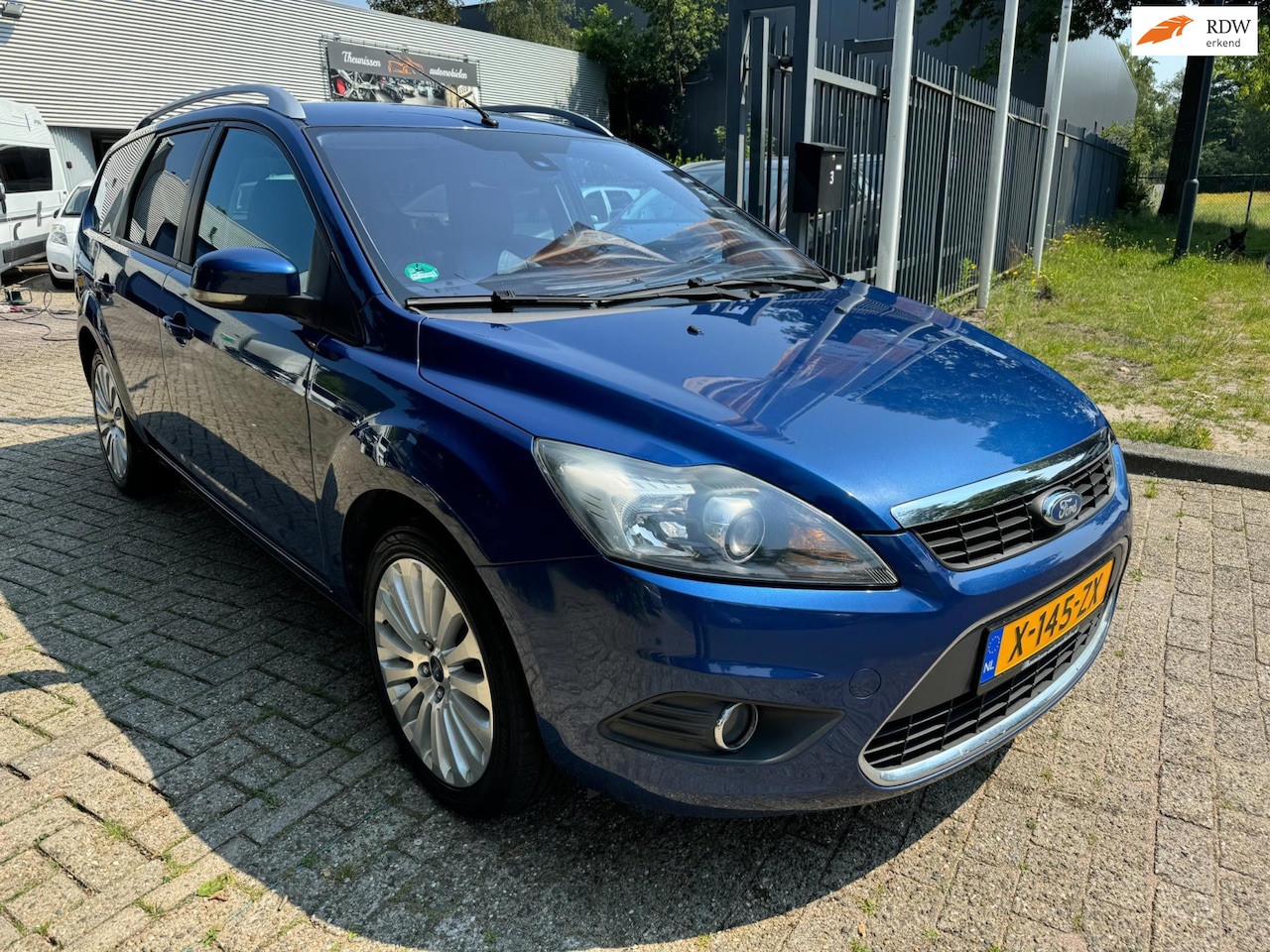 Ford Focus Wagon - 1.8 Titanium Flexi Fuel clima, elec pakket, alu wielen, getint glas navigatie, 107.170 km, - AutoWereld.nl