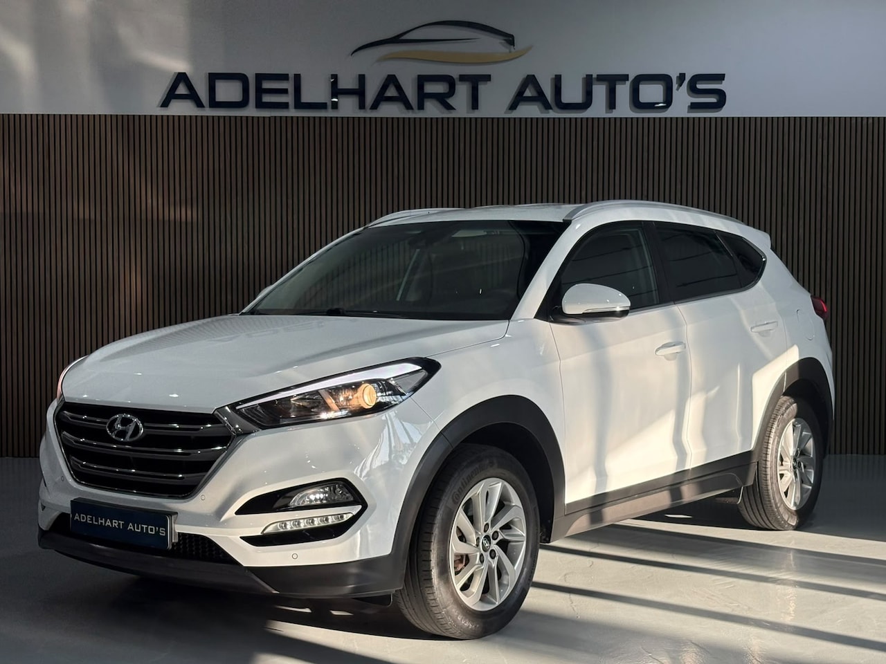 Hyundai Tucson - 1.6 GDi Comfort / Navigatie full Map / Camera / Cruise control / Parkeer sensoren - AutoWereld.nl