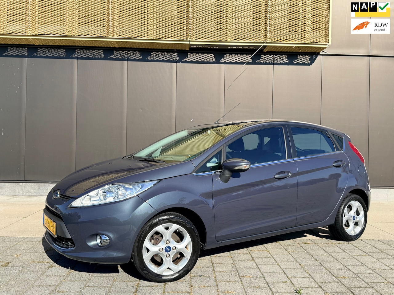 Ford Fiesta - 1.25 Titanium | D-riem VV | Cruise | PDC | Clima | Bluet| LM Velgen - AutoWereld.nl