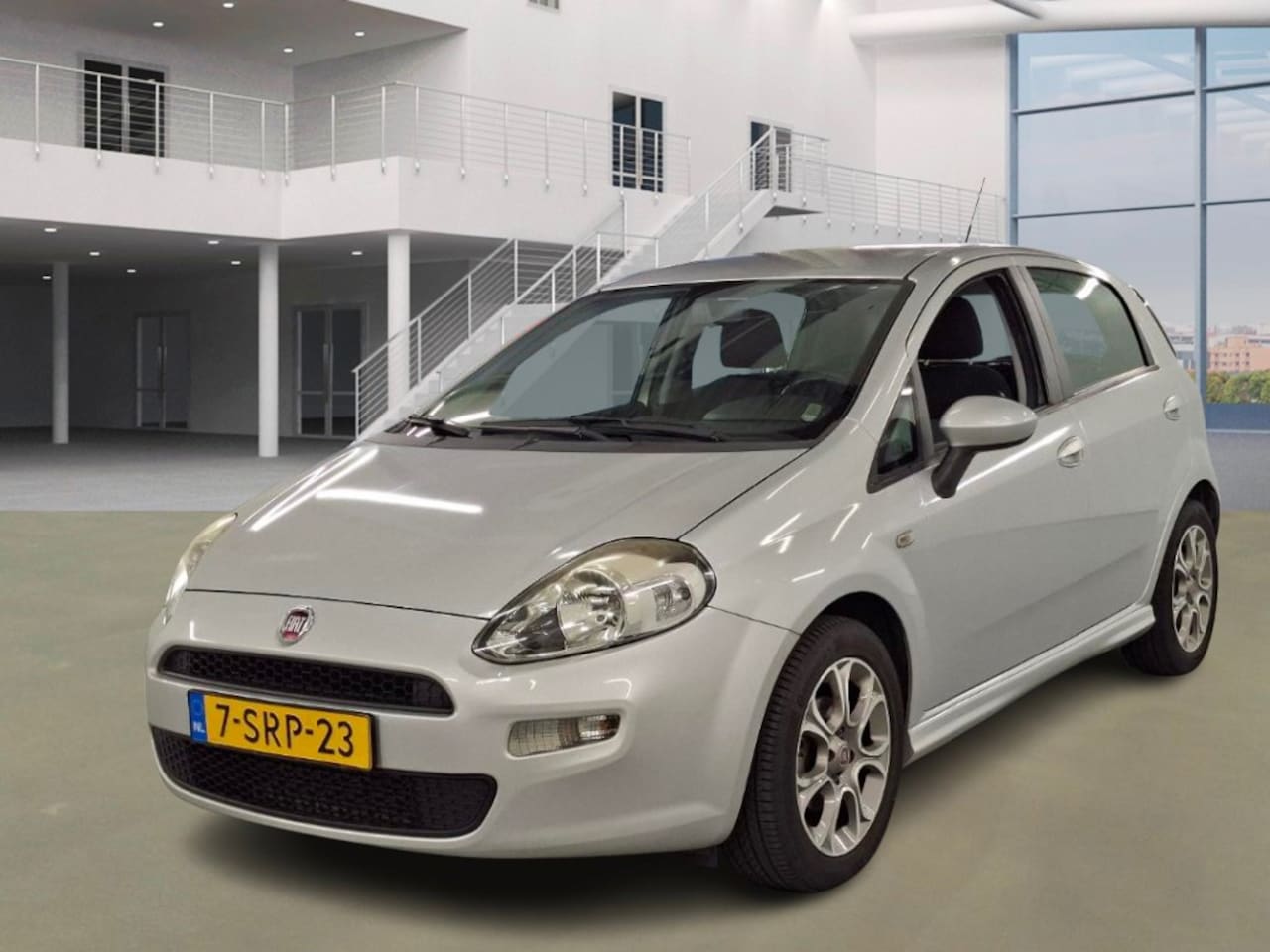 Fiat Punto Evo - 0.9 TwinAir Edizione Cool/ LAAG KM - AutoWereld.nl
