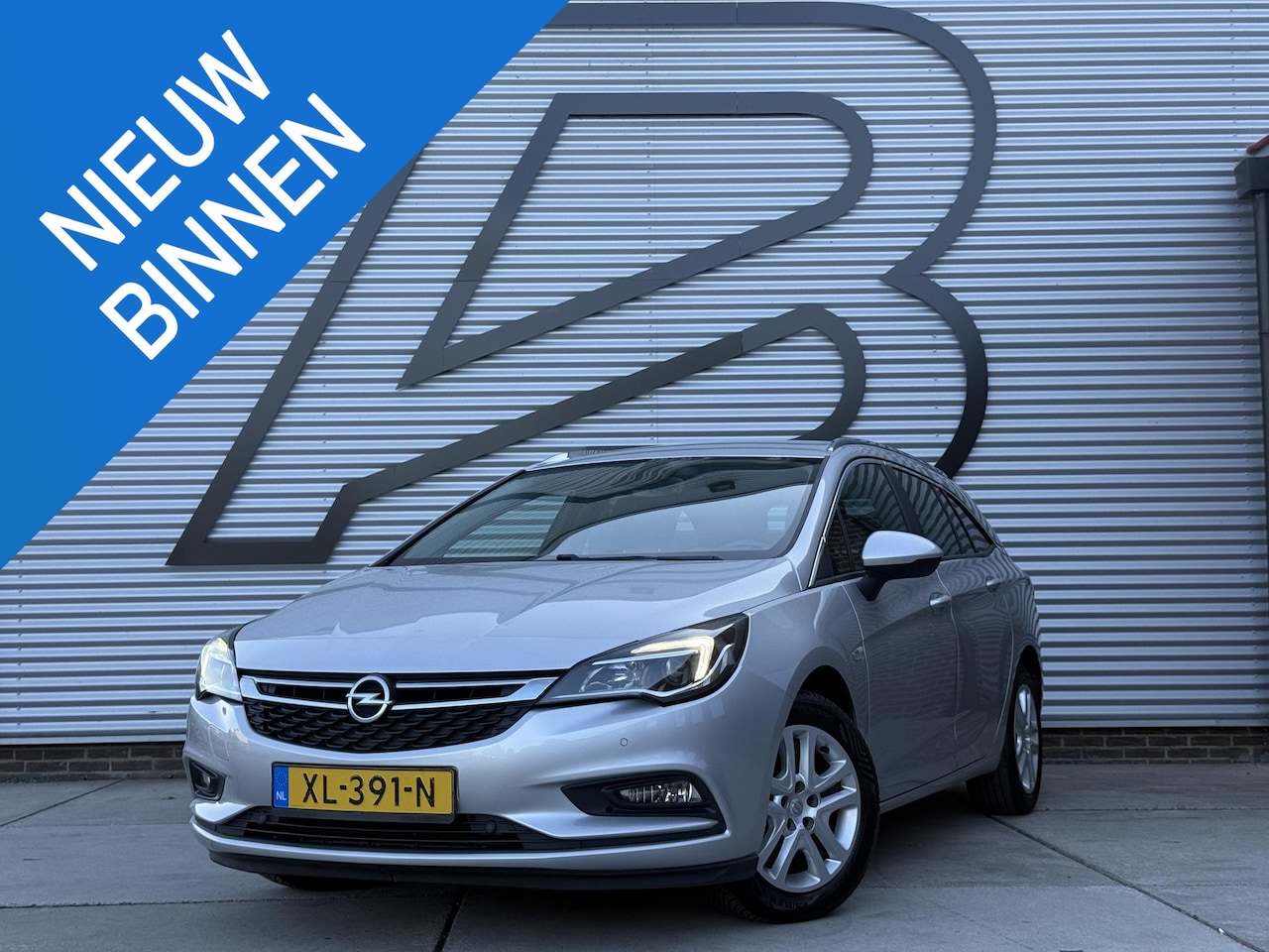 Opel Astra Sports Tourer - 1.4 Turbo Online Edition 2e Eigenaar|Navi|Trekhaak|Clima|Cruise|Carplay|PDC|Elek ramen|N.A - AutoWereld.nl