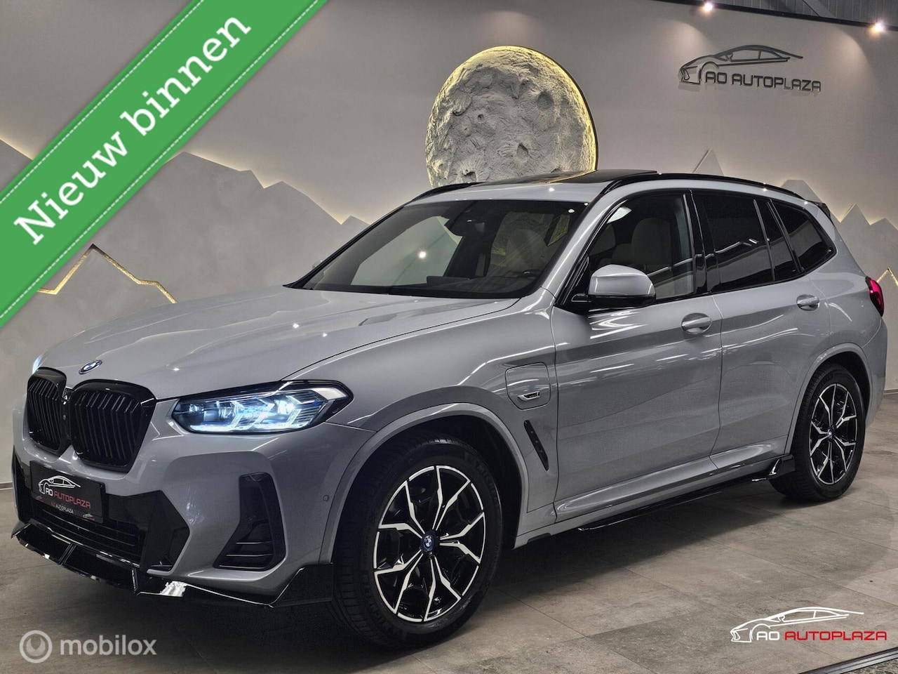 BMW X3 - xDrive30e High Executive M Sport Panorama/Keyless/HUD/Brooklyn grey - AutoWereld.nl