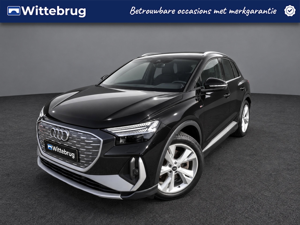 Audi Q4 e-tron - 40 77kW 204pk S-Edition / MMi Navigatie / Matrix LED / LM 20 inch / Parkeerhulp Plus / Dig - AutoWereld.nl