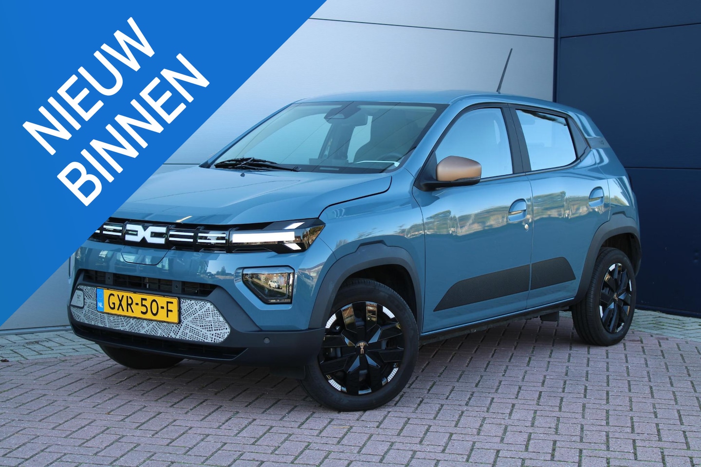 Dacia Spring - Extreme 65 26.8 kWh PARKEERHULP VOOR EN ACHTER-NAVIGATIE-10DKM! - AutoWereld.nl