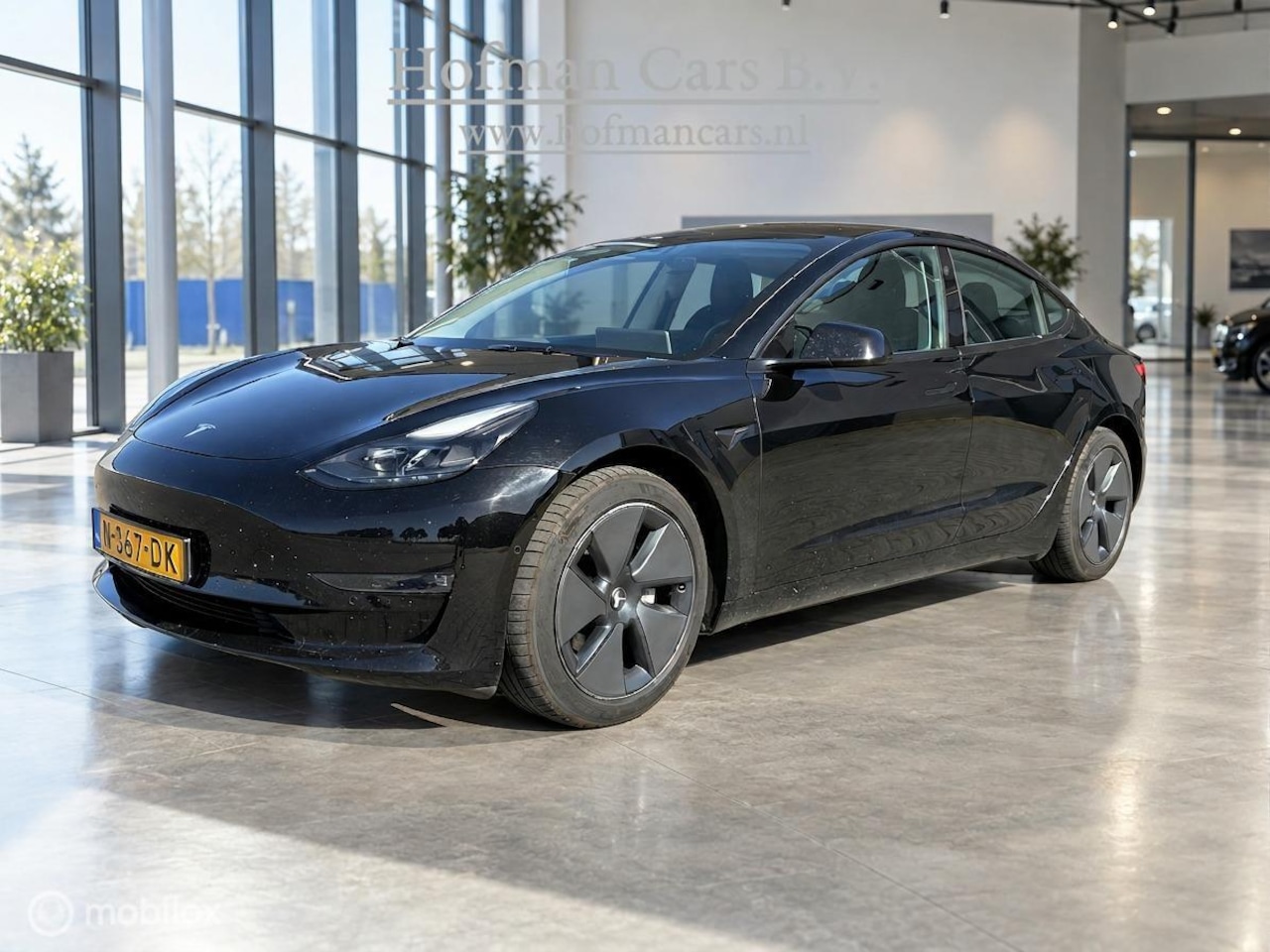 Tesla Model 3 - Long Range AWD 75 kWh | Warmtepomp | SOH 90,8% | 351 pk | Zwart - AutoWereld.nl