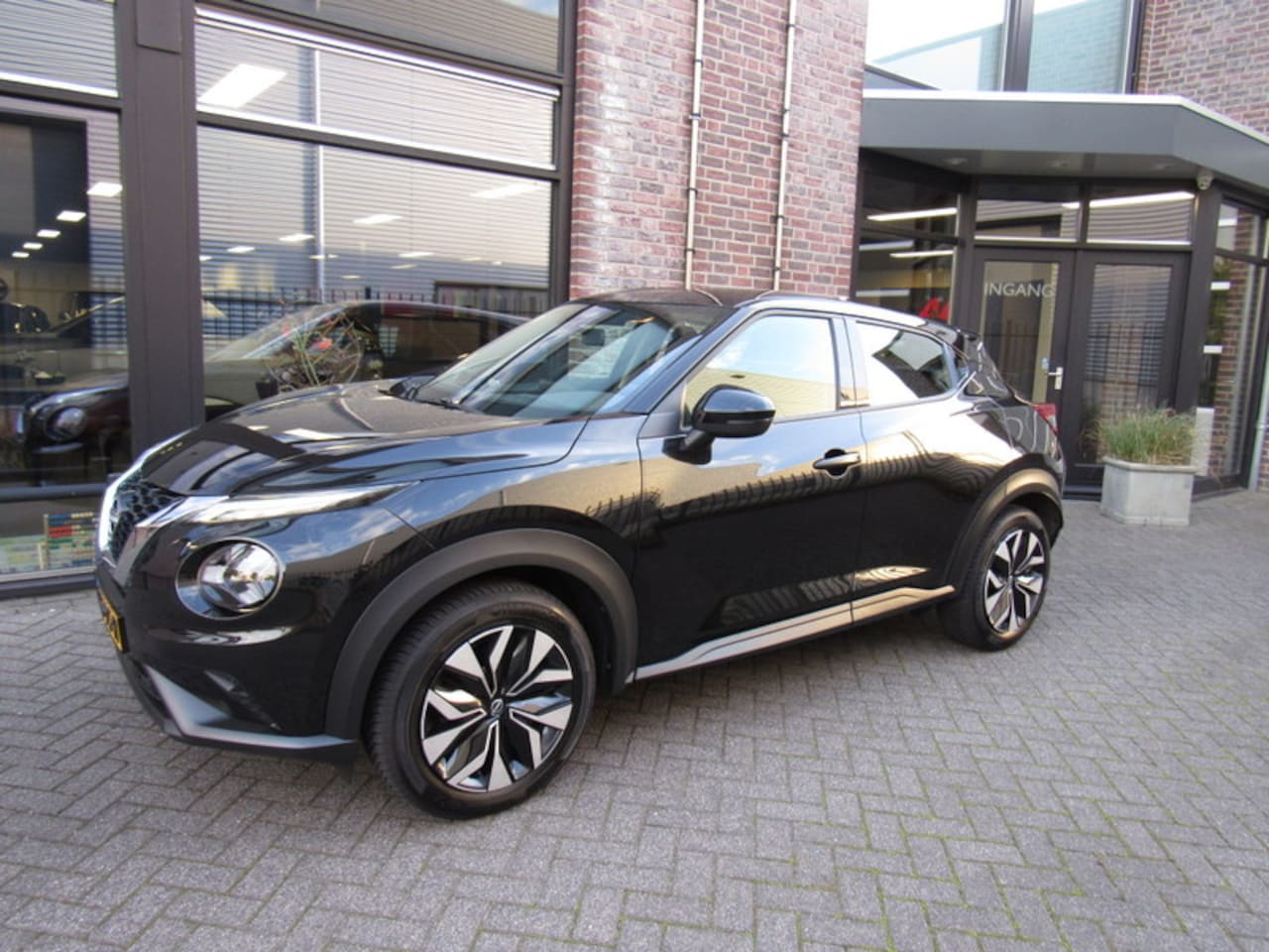 Nissan Juke - 1.0 DIG-T 114pk Acenta /automaat / Camera / AppleCarPlay - AutoWereld.nl
