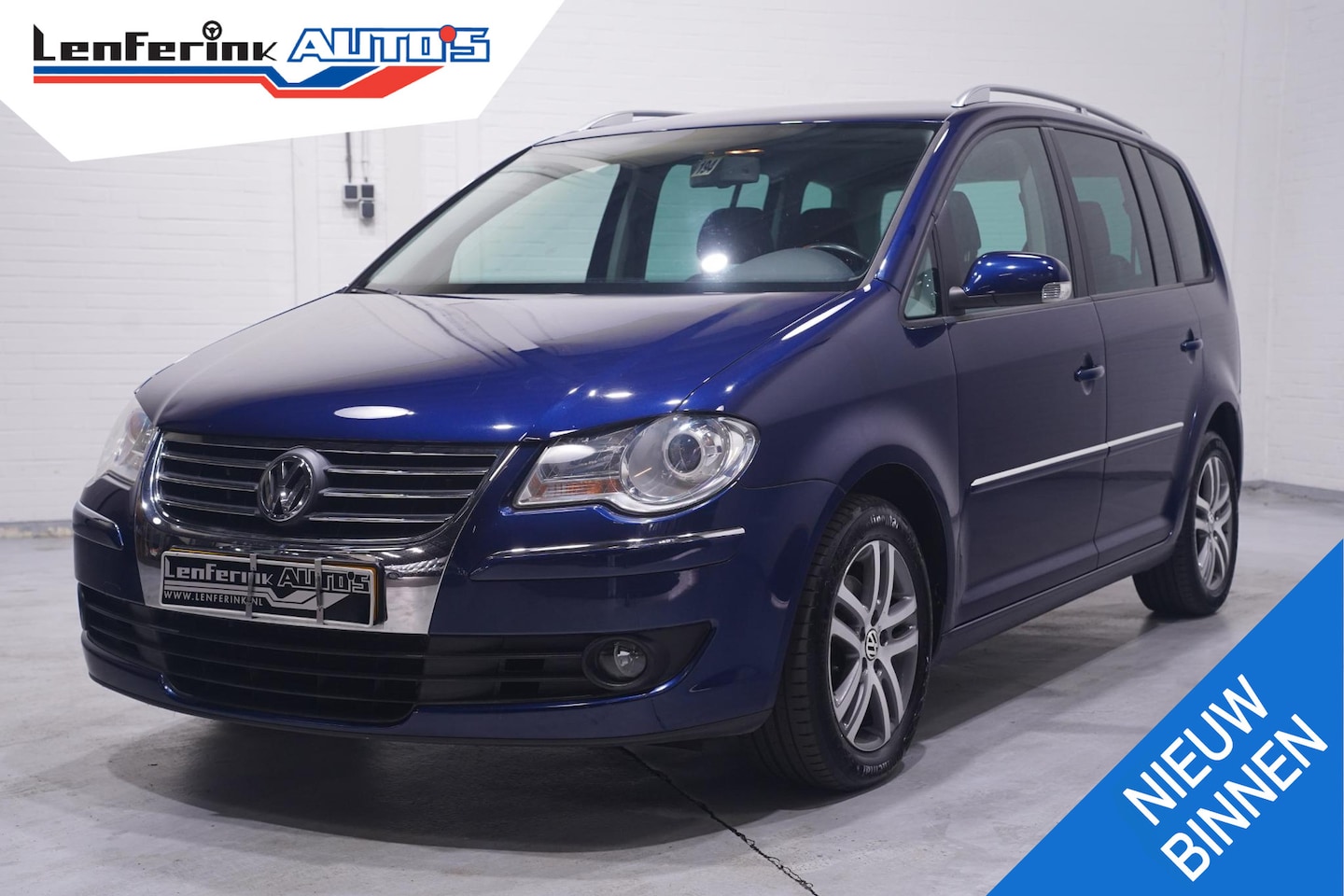 Volkswagen Touran - 1.4 TSI Highline NAP Leder Clima Xenon PDC Stoelverwarming - AutoWereld.nl