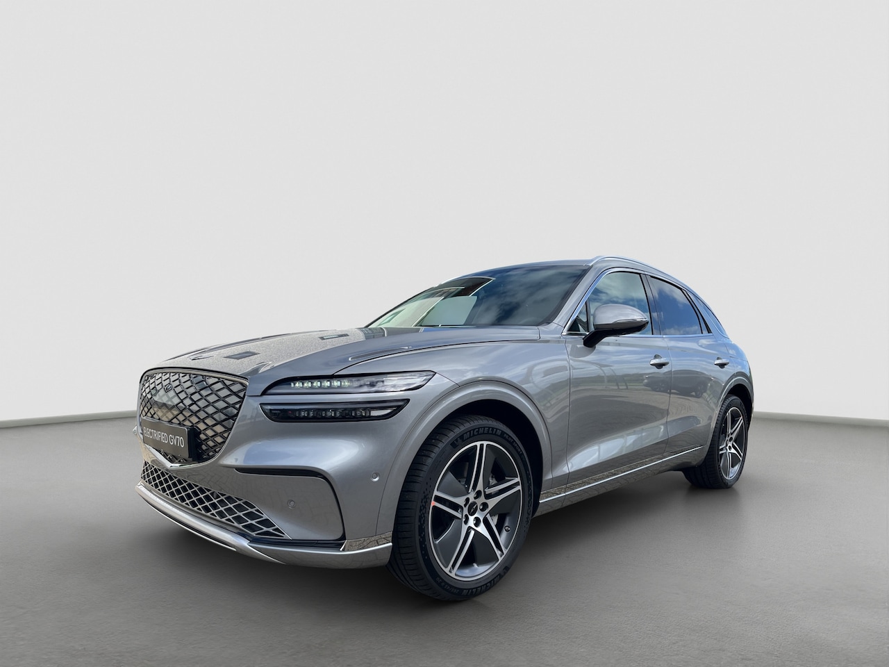 Genesis GV70 - 84kWh 490pk Luxury | BOMVOL! | 4WD |V2L | Panoramadak | Stoelverwarming- ventilatie | Napp - AutoWereld.nl