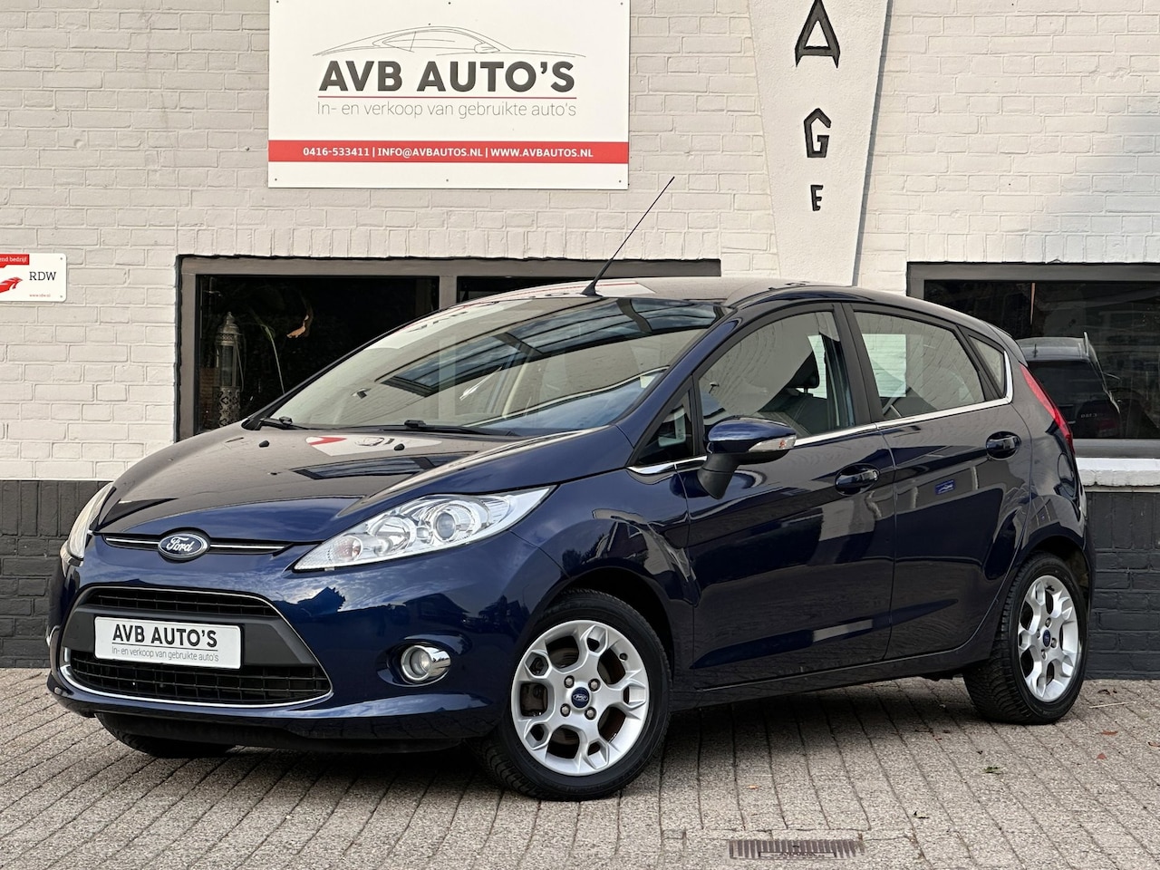 Ford Fiesta - 1.4 Titanium Clima USB AUX PDC Stoelverwarming - AutoWereld.nl