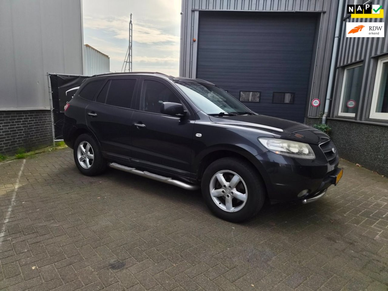 Hyundai Santa Fe - 2.2 CRDi VGT StyleVersion 2.2 CRDi VGT StyleVersion - AutoWereld.nl