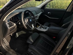 BMW 3-serie Touring - 320e Business Edition Plus | Camera | Laser | Stoelverwarming | Carplay |