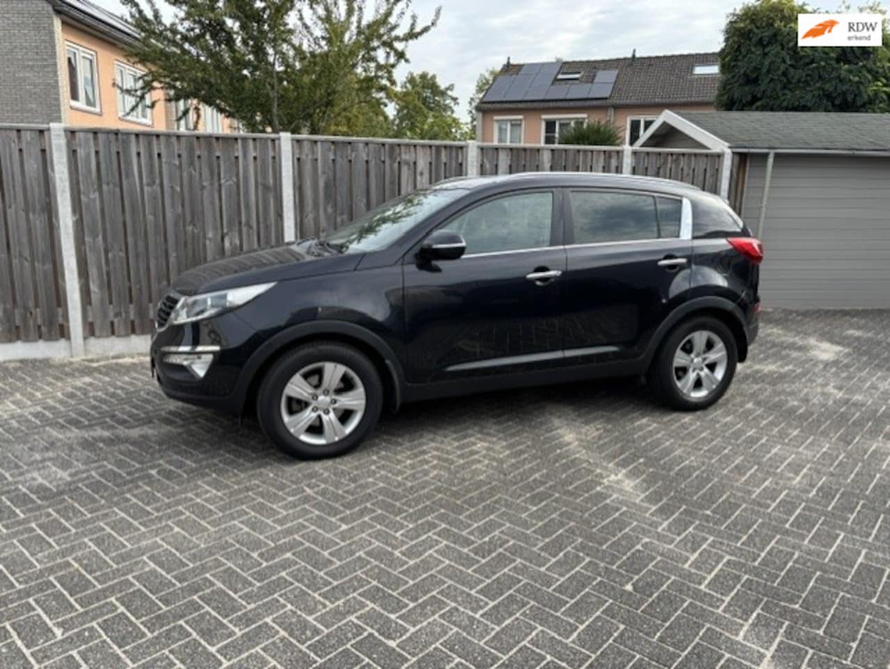 Kia Sportage - 1.6 GDI 20th Anniversary navigatie clima cruise control trekhaak - AutoWereld.nl