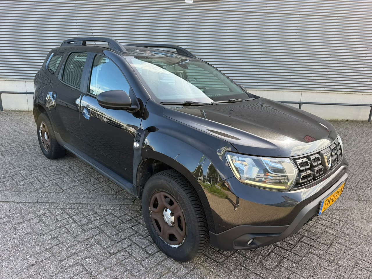 Dacia Duster - **Dacia Duster 1.2 TCe Comfort | 2018 | Nieuwe APK | Ruime SUV | Zwart | Benzine | Handges - AutoWereld.nl