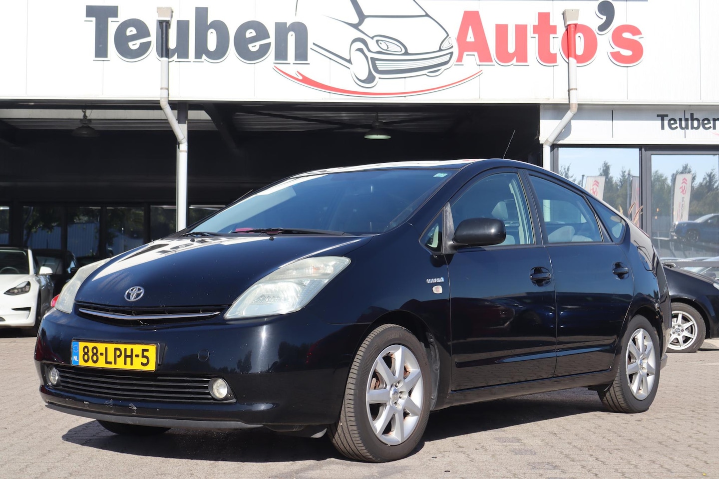 Toyota Prius - 1.5 VVT-i Tech Edition | Navigatie | Camera | Cruise | Clima | Dealer onderhouden - AutoWereld.nl