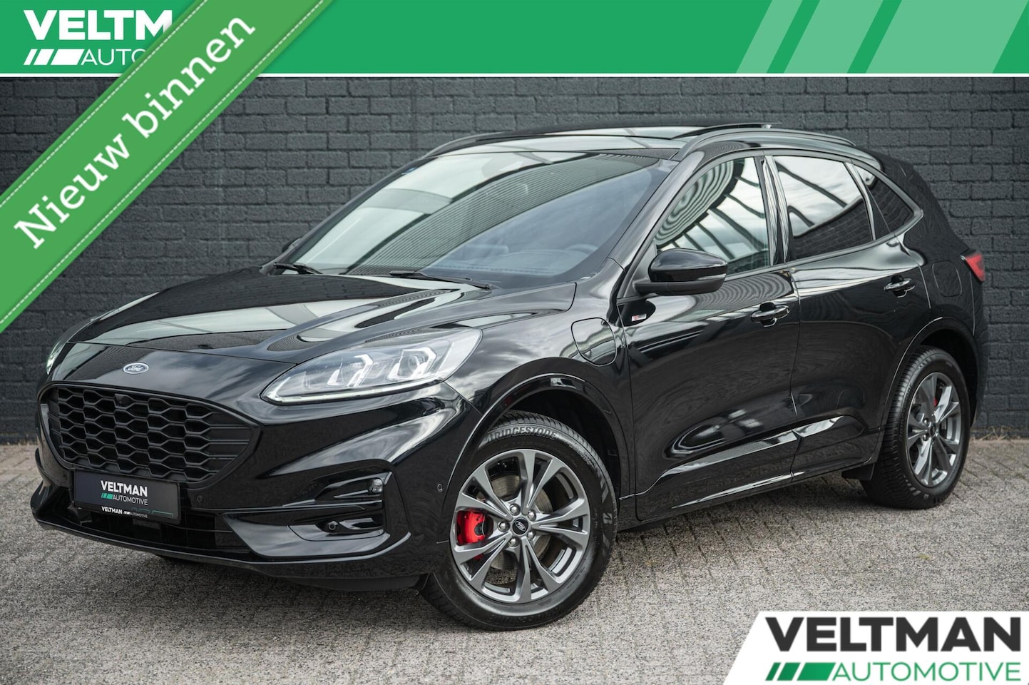 Ford Kuga - 2.5 PHEV ST-Line X PANO TREKHAAK ADAPTIVE CRUISE HEAD UP CAMERA STUURVERWARMING B&O - AutoWereld.nl