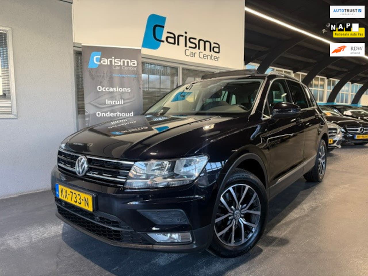 Volkswagen Tiguan - 1.4 TSI Connected Series Pano|Navi|Trekhaak - AutoWereld.nl