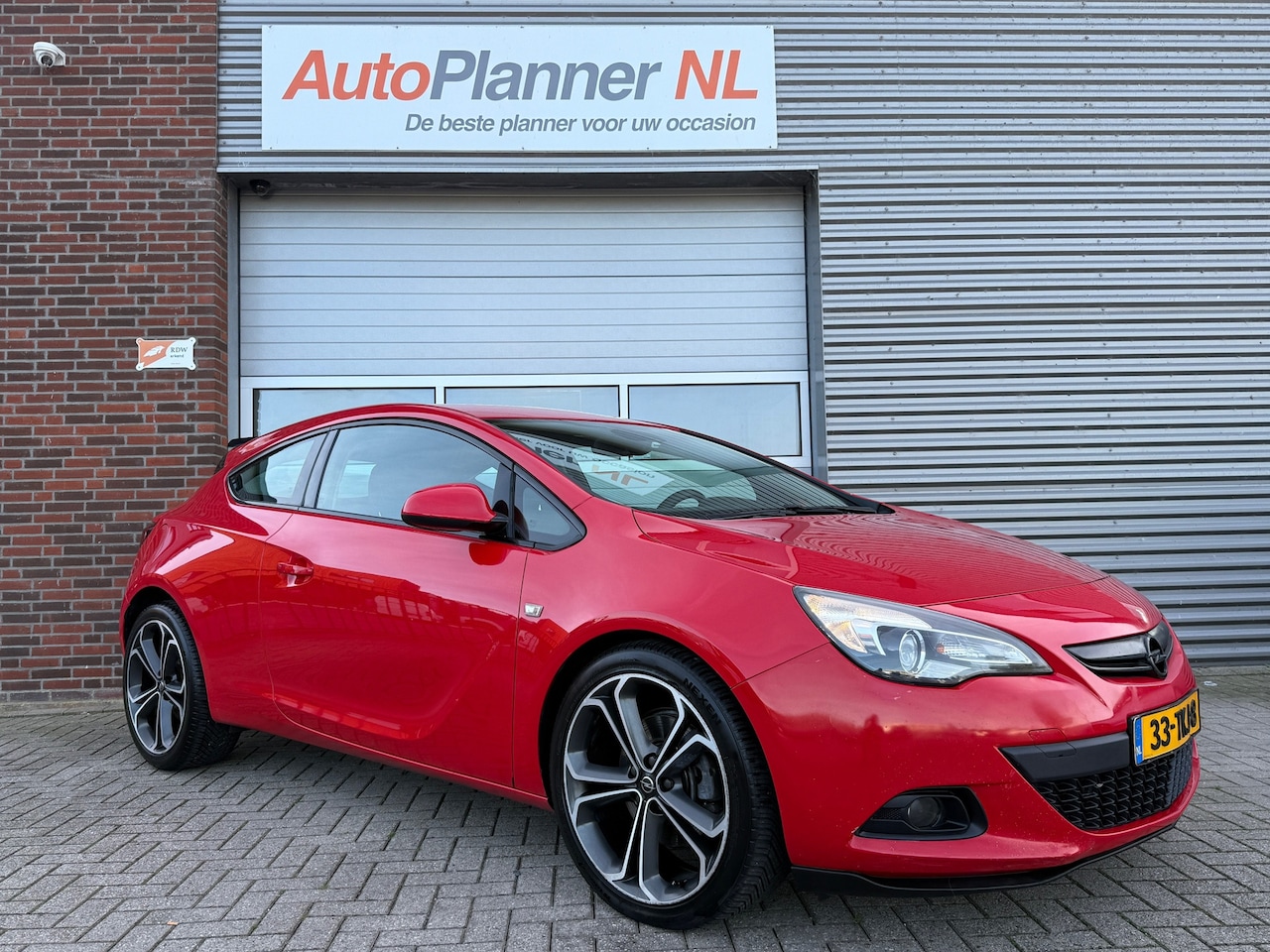 Opel Astra GTC - 1.4 Turbo Sport! Airco! Cruise! Carplay! - AutoWereld.nl