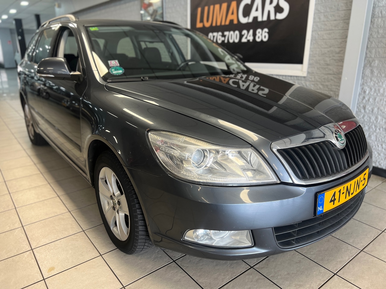 Skoda Octavia Combi - 1.2 TSI Ambition Business Line | NW APK | - AutoWereld.nl
