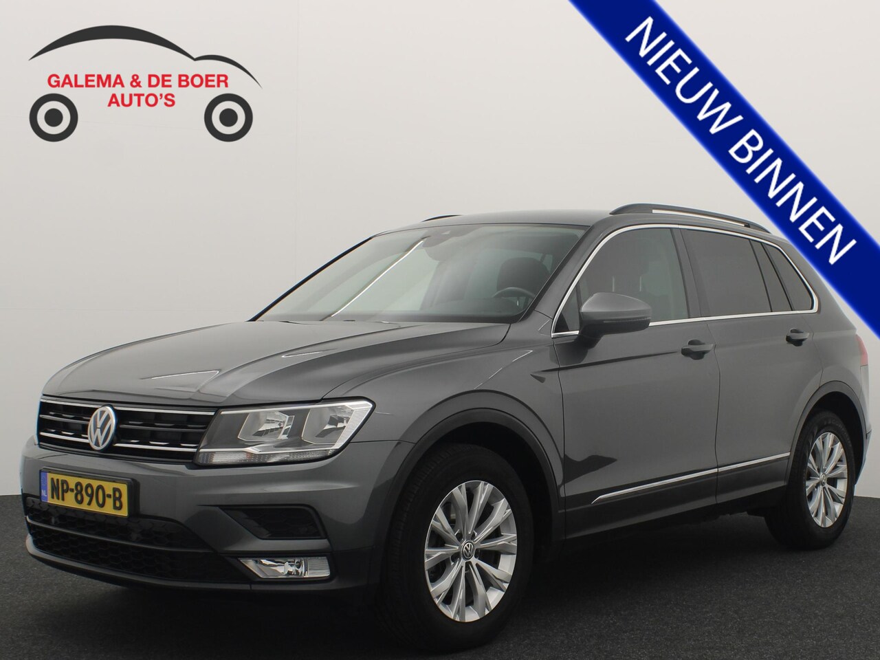 Volkswagen Tiguan - 1.4 TSI Comfortline 1STE EIG / NAVI / CLIMA / PDC / BLUETOOTH / CRUISE / NL-AUTO - AutoWereld.nl