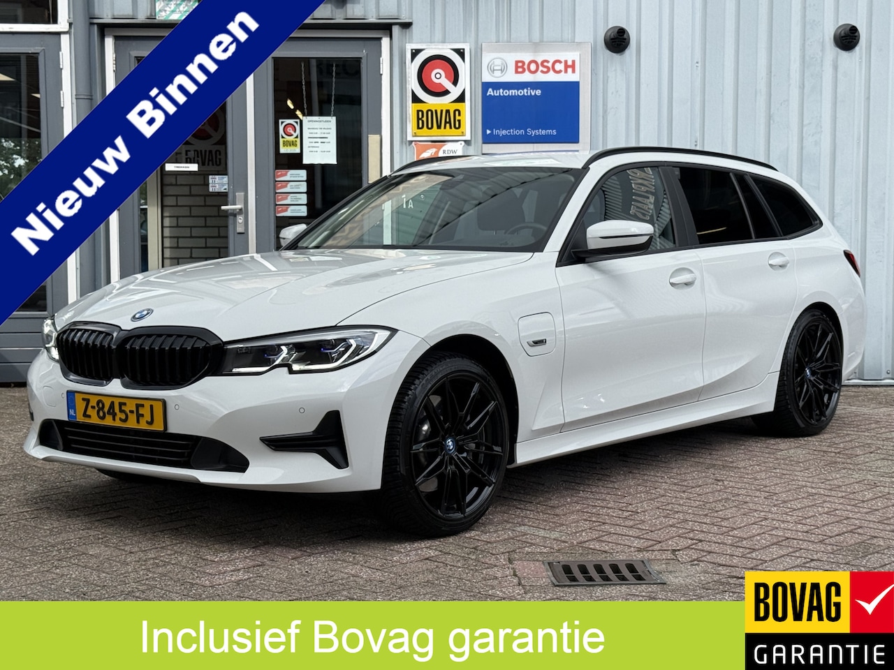 BMW 3-serie Touring - 330e High Executive | LASER LED | 19 " |  CAMERA | HEAD-UP | ELEKTR KLEP | NAVI | CARPLAY - AutoWereld.nl