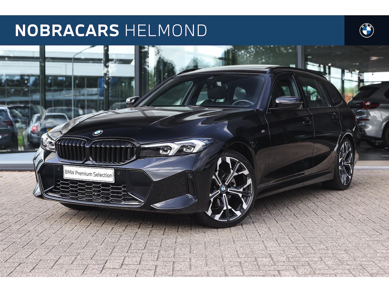 BMW 3-serie Touring - 320i M Sport Automaat / Panoramadak / Trekhaak / Sportstoelen / M Sportonderstel / Achteru - AutoWereld.nl