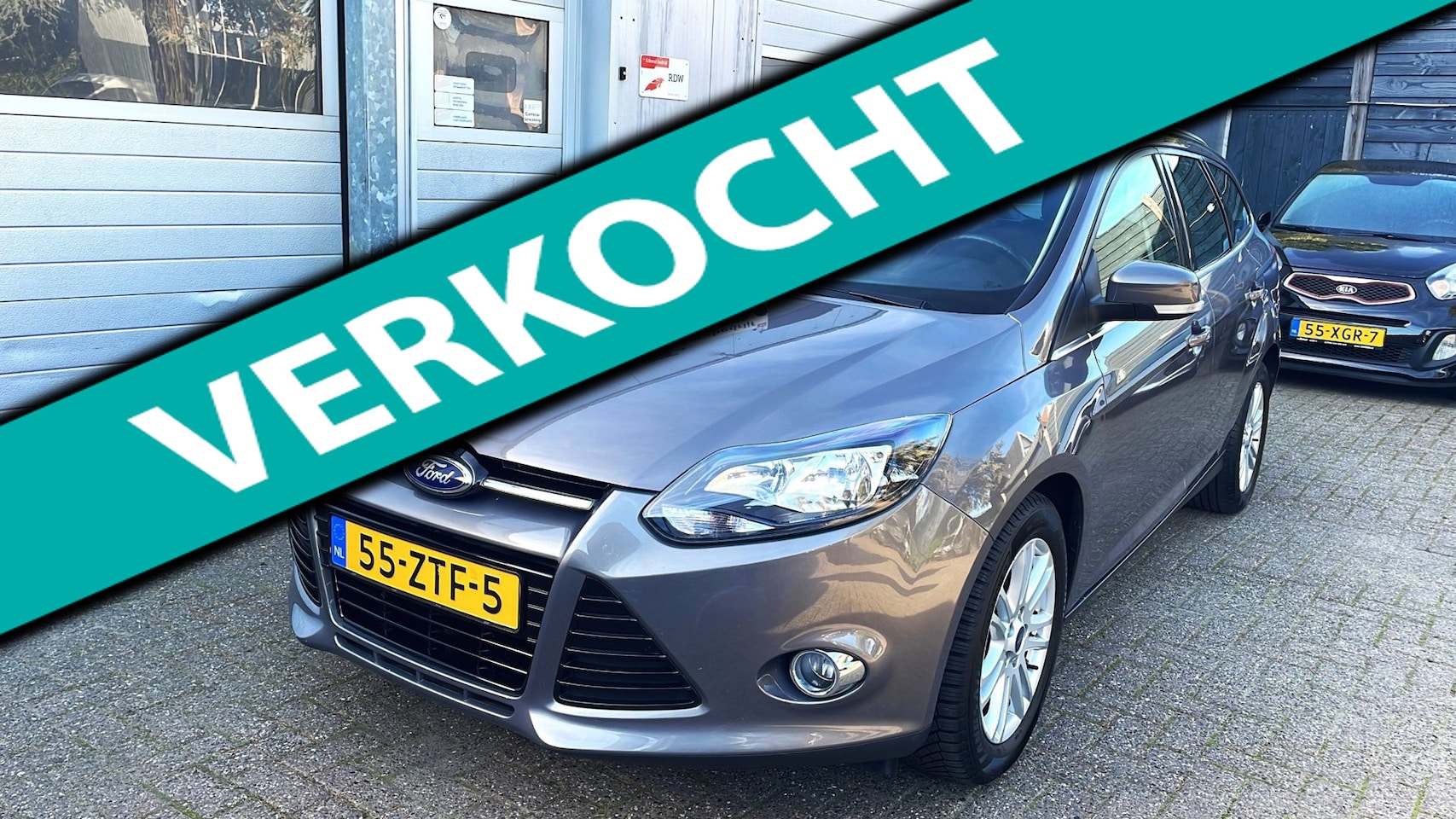 Ford Focus Wagon - 1.0 EcoBoost Titanium-Navi-Clima-Trekhaak - AutoWereld.nl