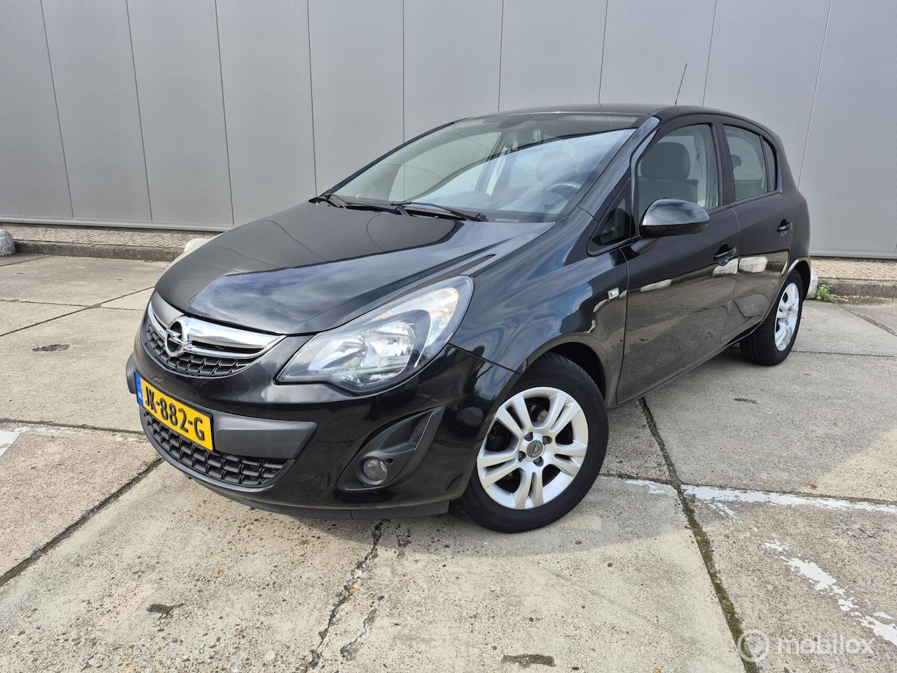 Opel Corsa - 1.4-16V Airco / Cruise / Navi / Elek ramen - AutoWereld.nl