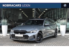 BMW 3-serie Touring - 320e M Sport Automaat / Panoramadak / Sportstoelen / Getint glas / Stoelverwarming