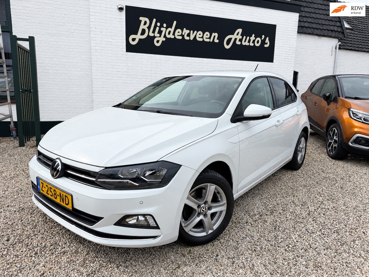 Volkswagen Polo - 1.0 TSI Highline Business Automaat | Carplay | PDC | Stoel VW | LM | Trekhaak - AutoWereld.nl