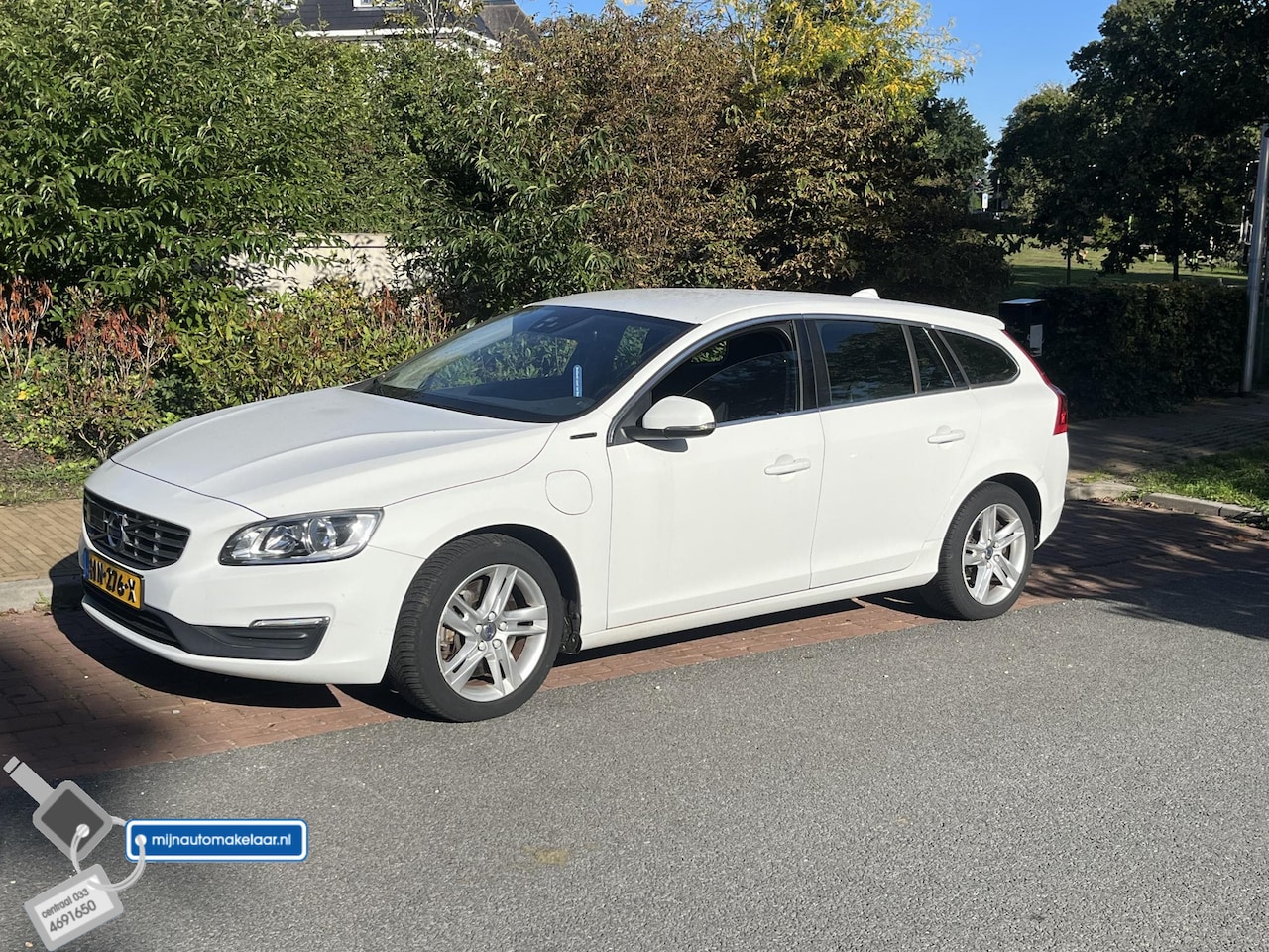 Volvo V60 - 2.4 D6 Twin Engine Momentum 100% onderhouden - AutoWereld.nl