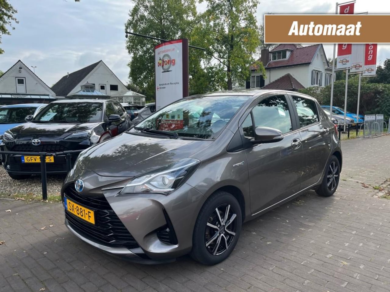 Toyota Yaris - 1.5 HYBRID DESIGN AUTOMAAT / NAVI / CAMERA / CRUISE CTR. / 15'' LM-VELGEN - AutoWereld.nl