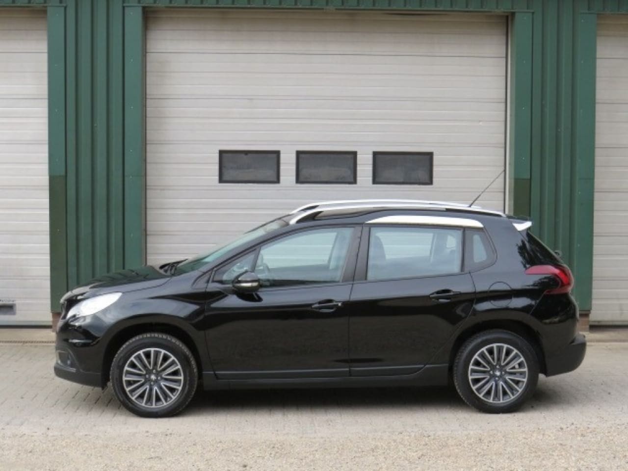 Peugeot 2008 - 1.2 PURET. BLUE LION - AutoWereld.nl