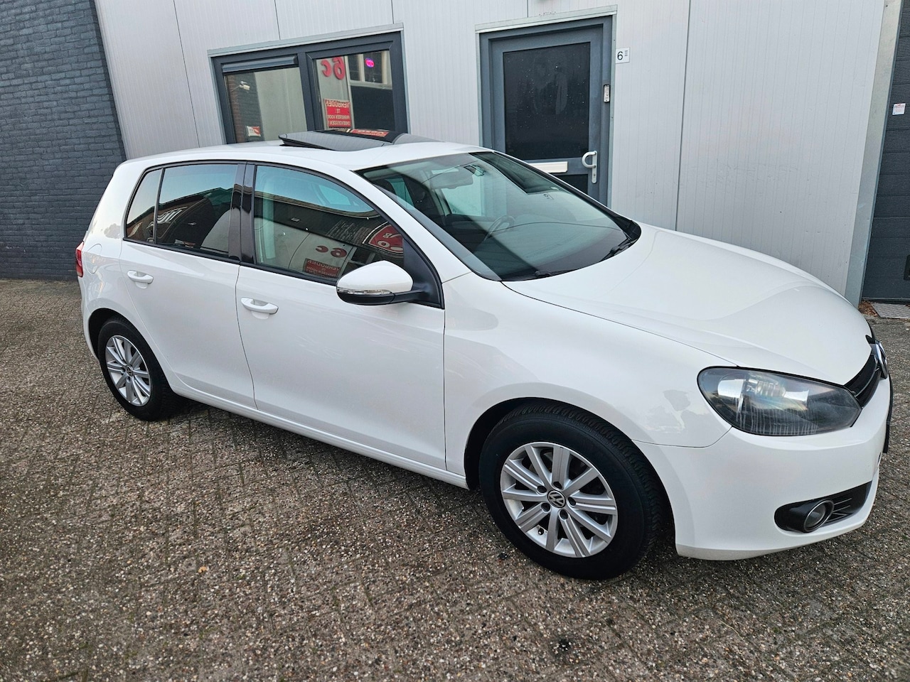 Volkswagen Golf - 1.2 TSI Highline BlueMotion|Navi|Airco|Cruise - AutoWereld.nl