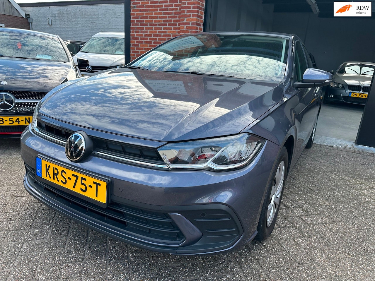 Volkswagen Polo - 1.0 TSI R-Line AUTOMAAT-NAVI-PDC-CRUISE - AutoWereld.nl