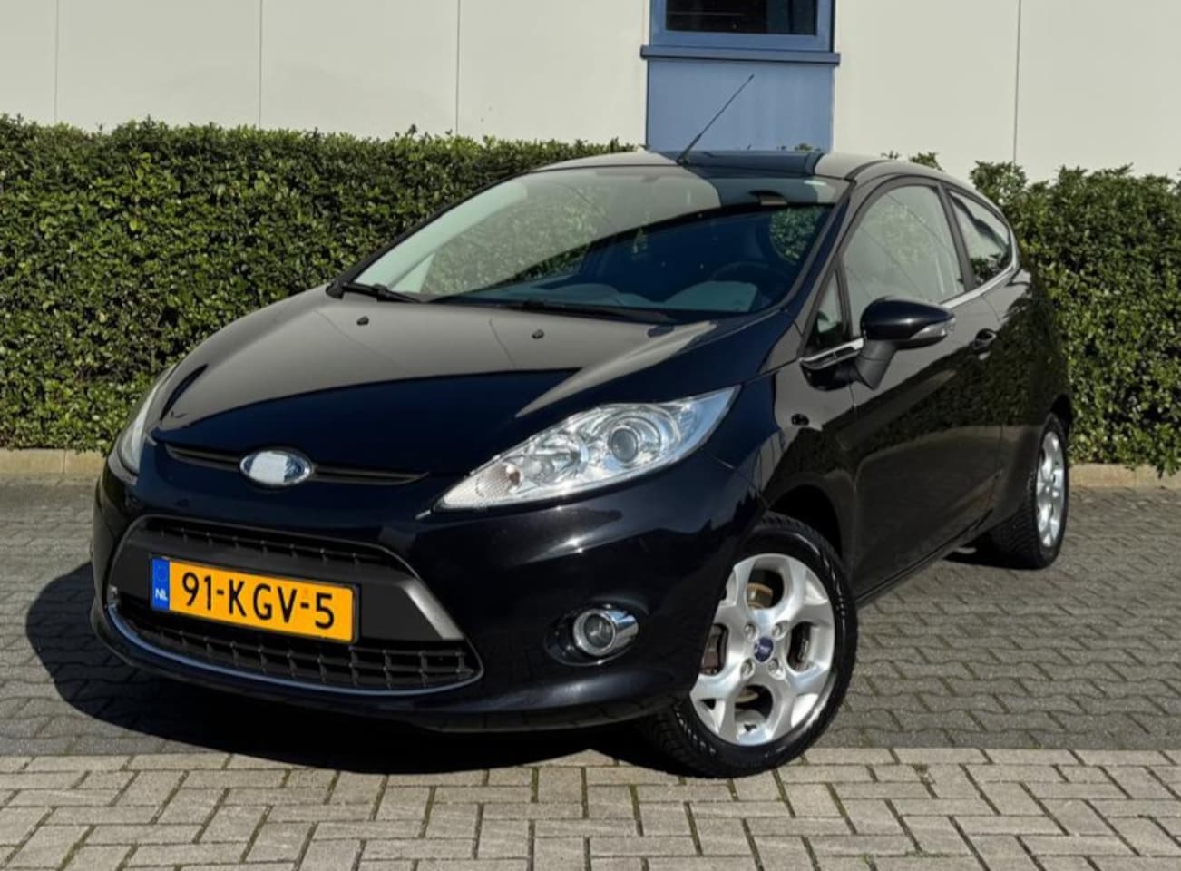 Ford Fiesta - 1.25 60pk 3D Titanium Airco - AutoWereld.nl
