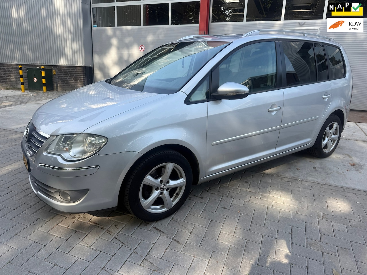 Volkswagen Touran - 1.4 TSI Highline CarPlay Navi - AutoWereld.nl