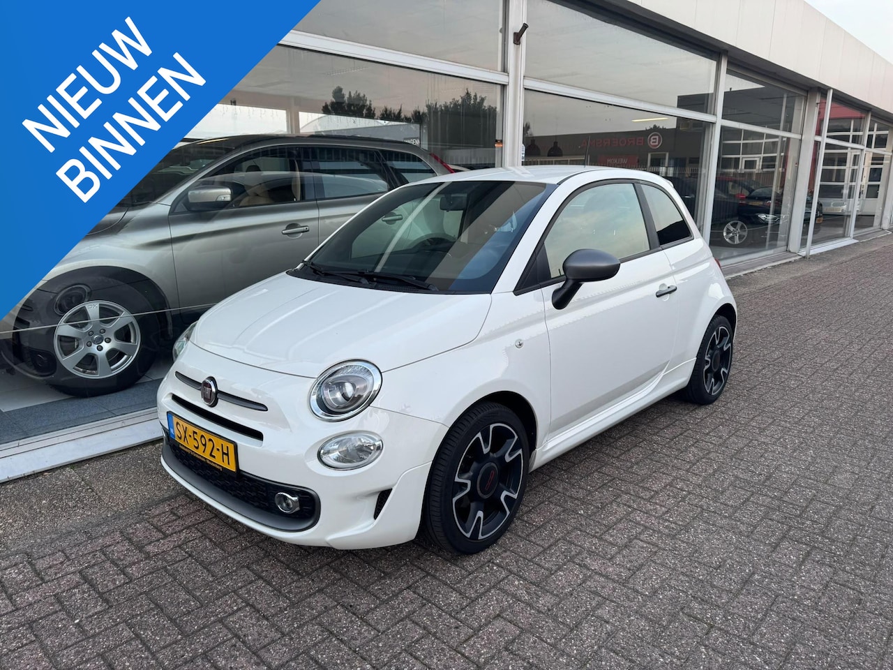 Fiat 500 - 1.2 Lounge | Airco | Elektrische ramen | Lederen bekleding | Cruise control | Navigatie | - AutoWereld.nl